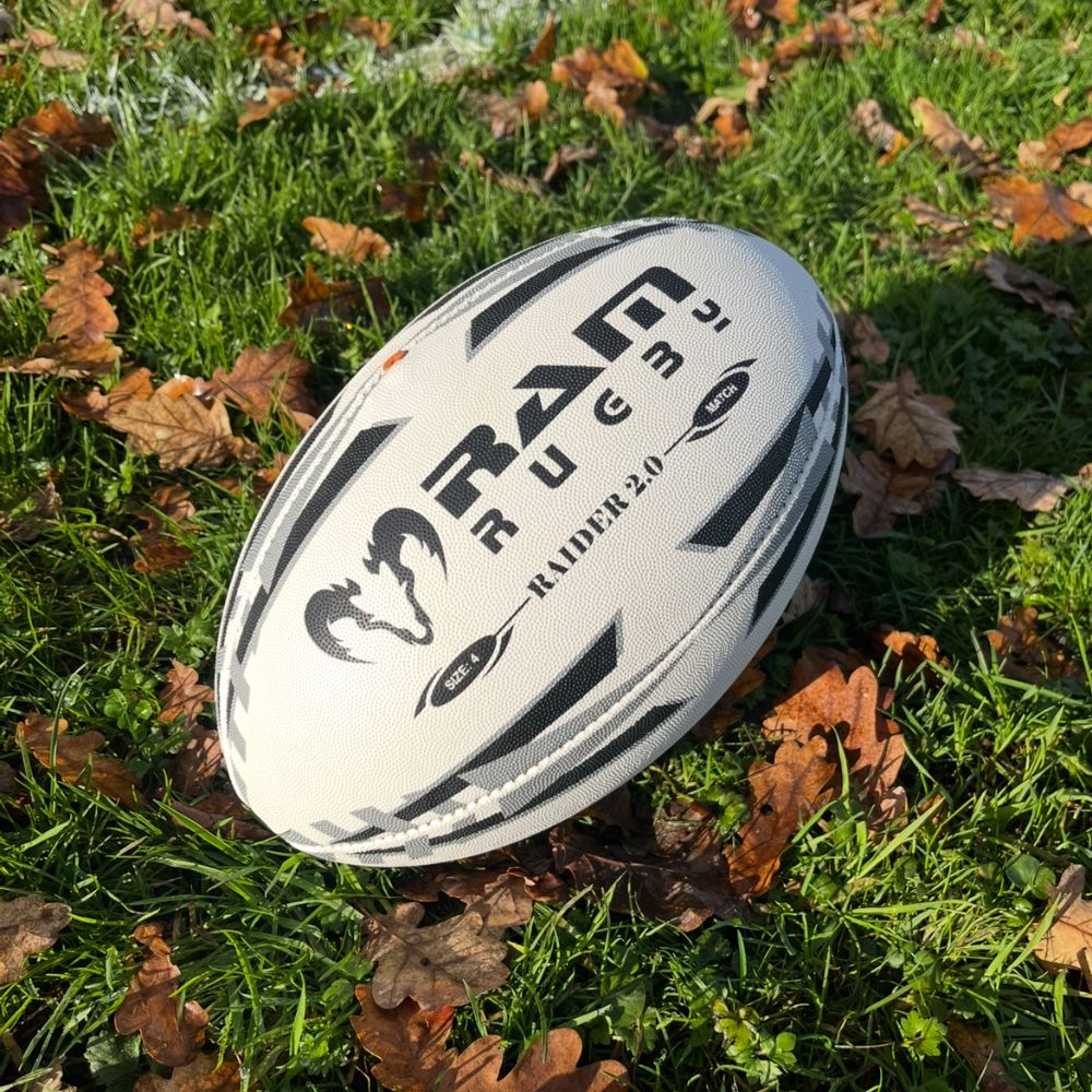 Close-up of Ram Rugby Raider 2.0 match ball showcasing durable 4-ply polycotton and rubber laminate construction for training and games
