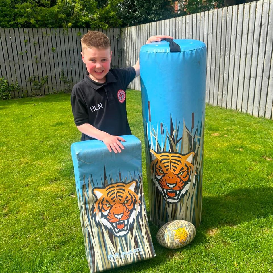 Ram Rugby Animal Design Curve Hit Shield showing curved black and orange contact pad for versatile rugby training