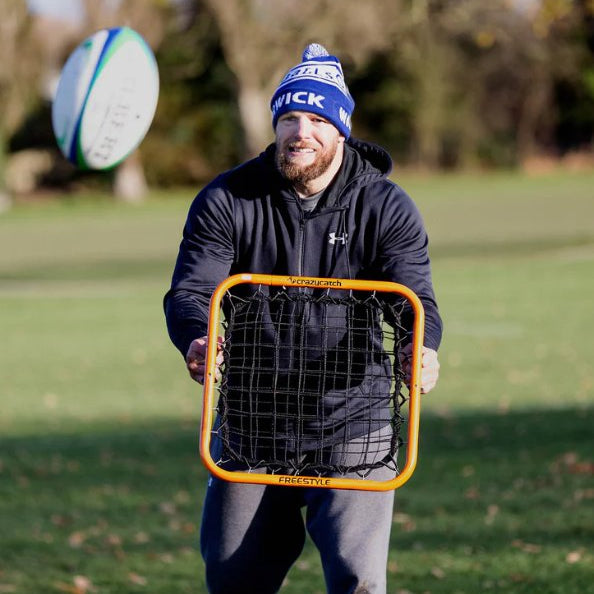 Crazy Catch Freestyle rebound net with dual-layer mesh and handheld frame for hand-eye coordination and catching training.