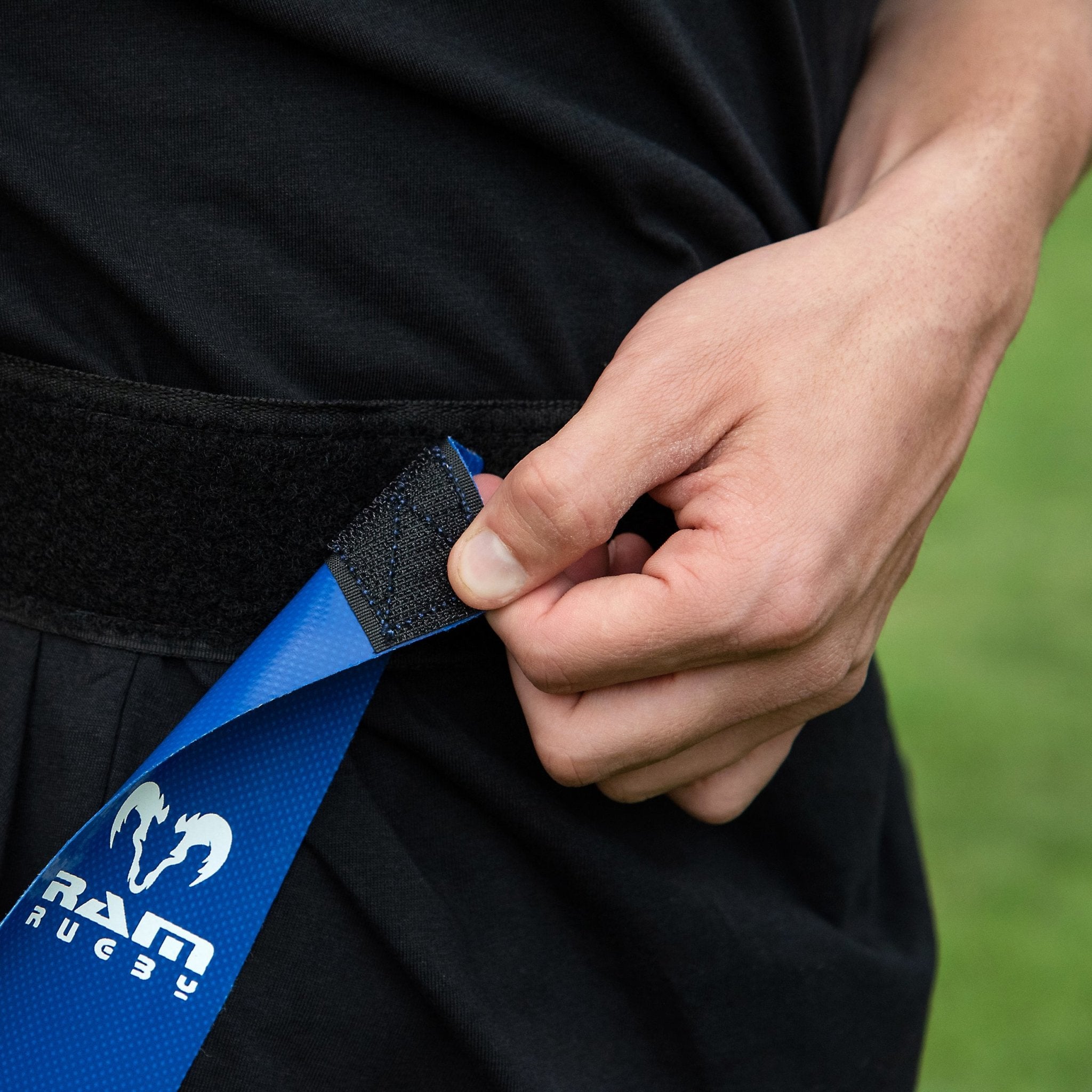 Ram Rugby custom PVC tag rugby belt set displayed with club logo print, durable material, and adjustable strap design.