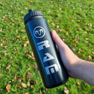 Black Ram Rugby 750ml ergonomic water bottle with push-pull lid and screw cap, ideal for rugby training hydration.