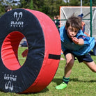 Ram Rugby Roller Tackle Bag showing durable 15KG model with sturdy blue cover and robust base for rugby training drills