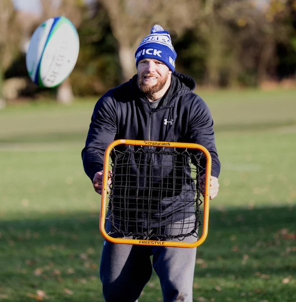 Crazy Catch Freestyle rebound net with dual-layer mesh and handheld frame for hand-eye coordination and catching training.